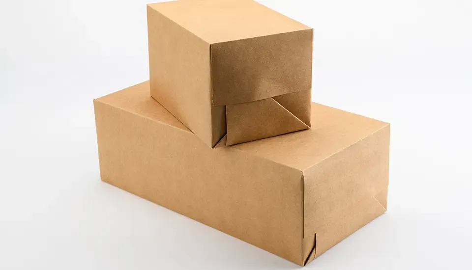 Groupage de boites sur-enveloppées avec papier kraft biodégradable